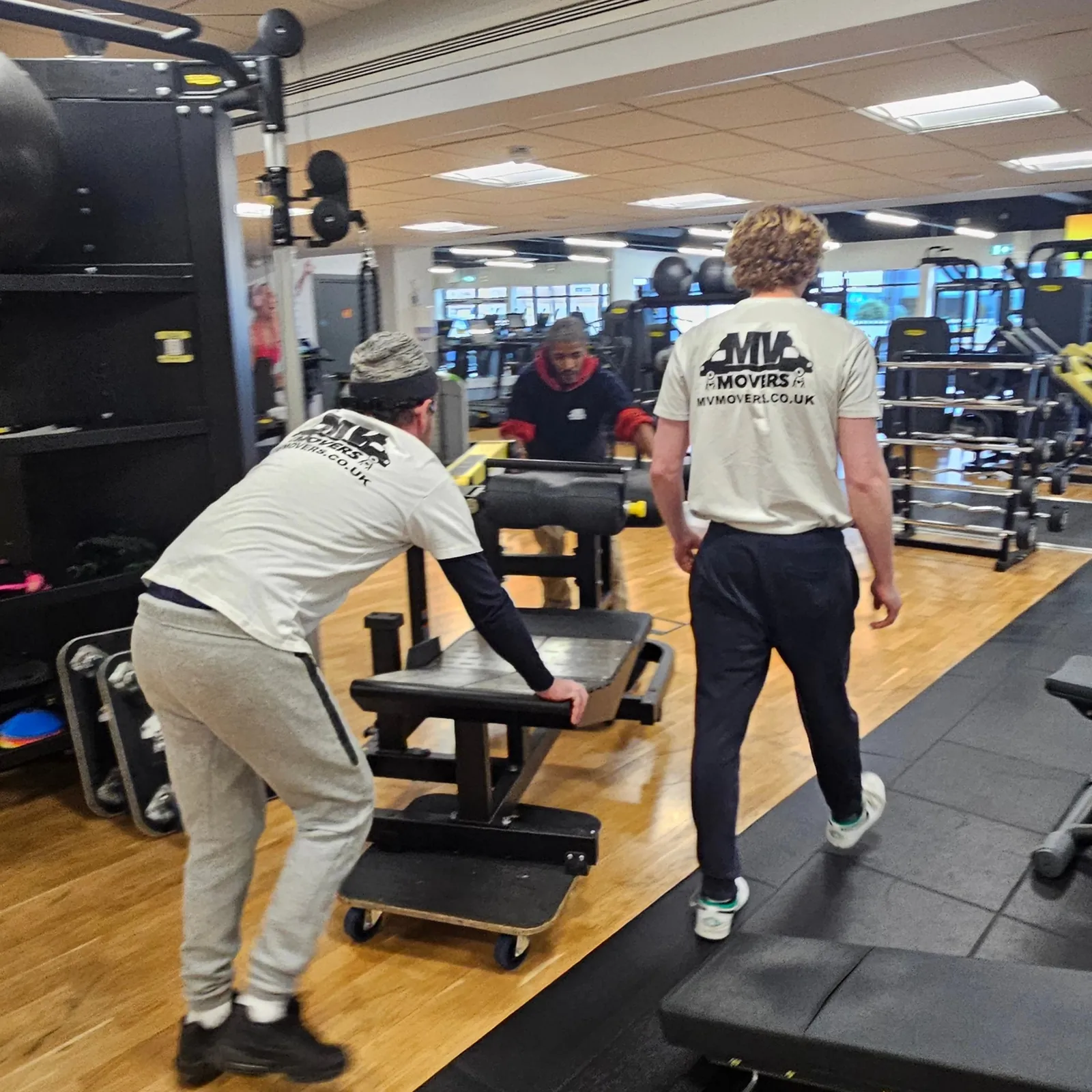 MV crew moving gym equipment
