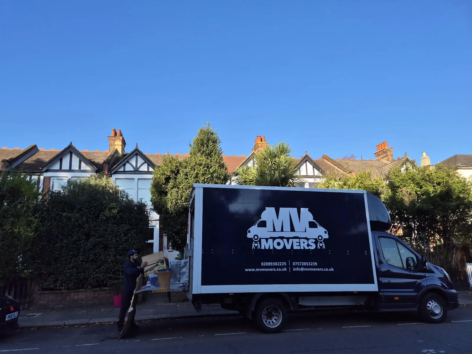 MV Movers Luton van outside a house in West London