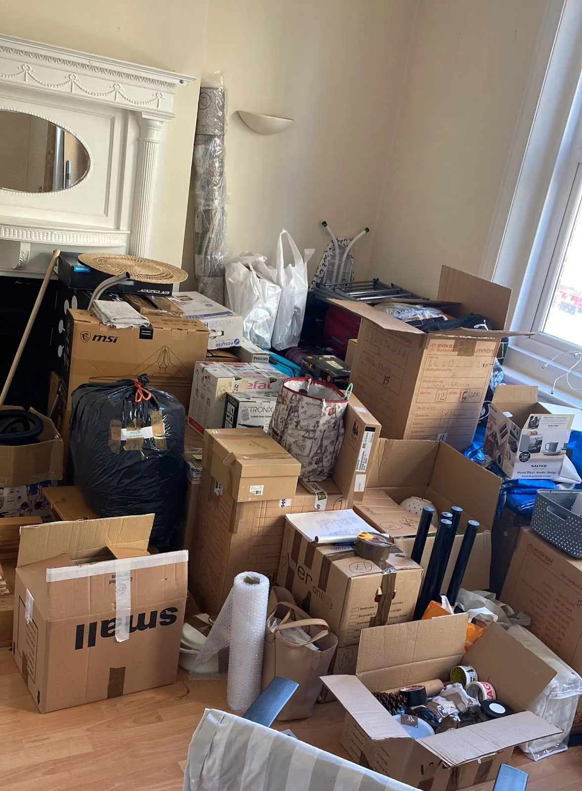 A room packed and labelled ready to move