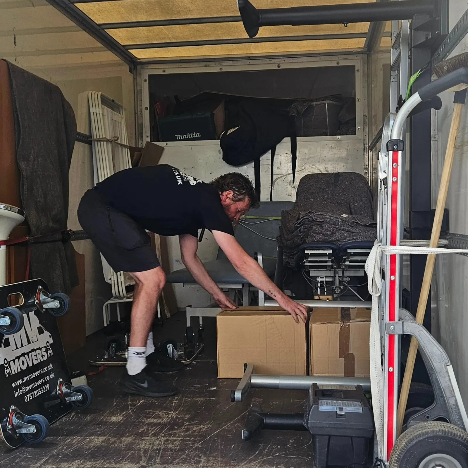Loaded and strapped – Blankets first, straps second